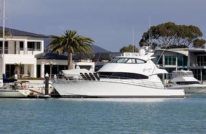 Out the front door and straight onto the boat. Good one! photo copyright  John Curnow taken at  and featuring the  class