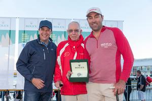 Owner Bob Oatley and skipper Mark Richards receive the trophy from Patrick Boutellier of Rolex Australia for winning Line honours in the 2013 Rolex Sydney to Hobart photo copyright Andrea Francolini taken at  and featuring the  class