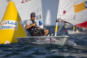 The Laser World Championships 2013 - Standard. Mussanah Oman The final day of racing, Philipp Buhl (GER) shown here in action and celebrating after finishing 3rd overall photo copyright Lloyd Images taken at  and featuring the  class