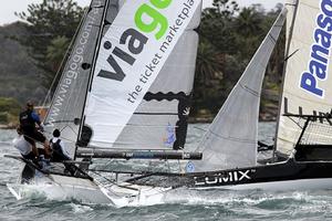 Viagogo rolls over the top of Lumix after the first mark rounding - Race 1, 2013 NSW 18ft Skiff Championship photo copyright Frank Quealey /Australian 18 Footers League http://www.18footers.com.au taken at  and featuring the  class
