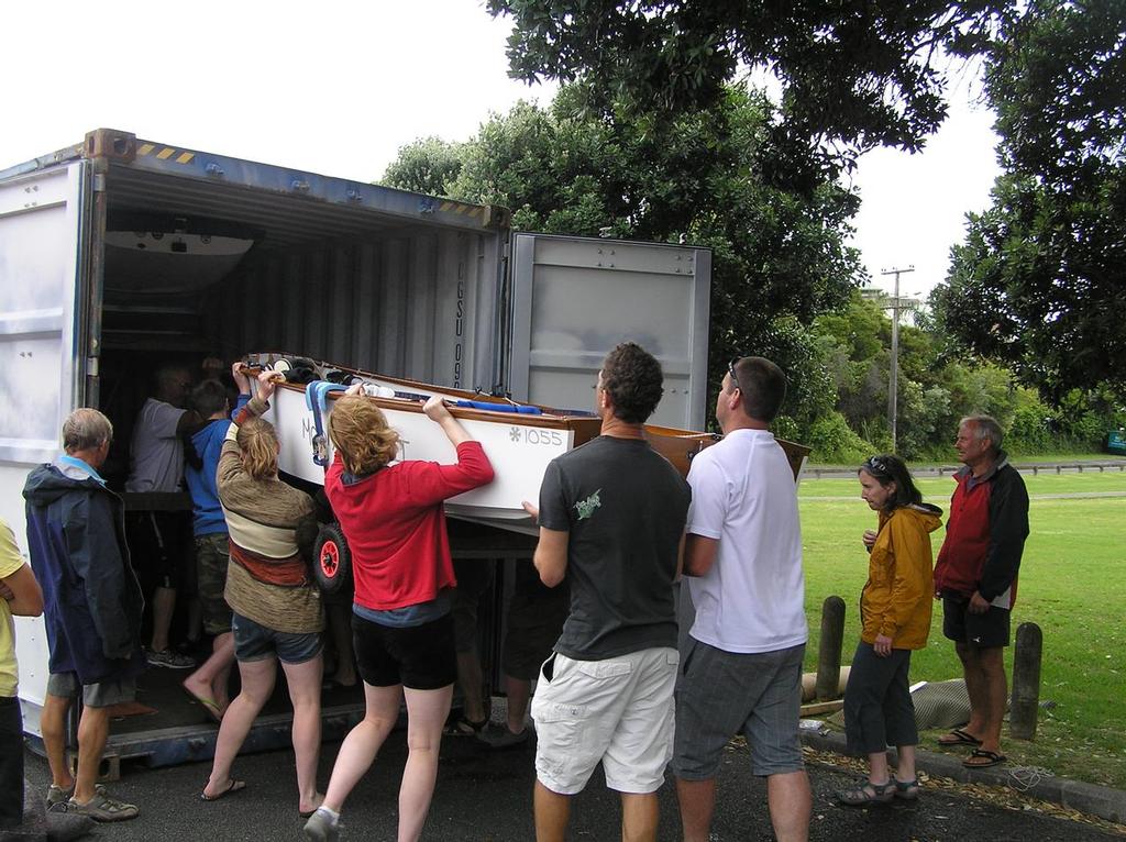 How many people does it take to lift a sunburst ? The answer here is 9. Loading #1055 Moonbeam, the last to go in of 9 into the 40 ft container to return to Dunedin.  - 2014 Sunburst Nationals photo copyright Nigel Price taken at  and featuring the  class