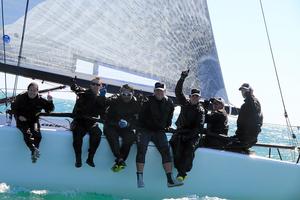 Champions — Alec Cutler, Hedgehog (From left to right: Alan 'Budda' Nakanishi (not shown), Sarah Callahan, Chafee Emory, Eric Dorman, Mike Wolfs, Richard Clarke, Max Skelley, Alec Cutler) - 2014 Quantum Key West Race Week Melges 32 photo copyright JOY - International Melges 32 Class Association http://melges32.com/ taken at  and featuring the  class
