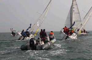 Two boat team racing - ‘Haofeng’ New Year’s Cup 2014 photo copyright Qingdao International Marine Club taken at  and featuring the  class