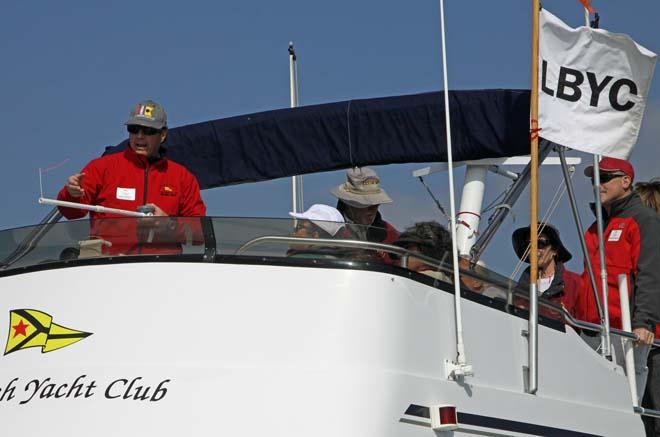 PRO John Busch (left) shows how to sight wind direction and plan a race course setup during LBYCâ€™s Race Management Training Day. © Rick Roberts 