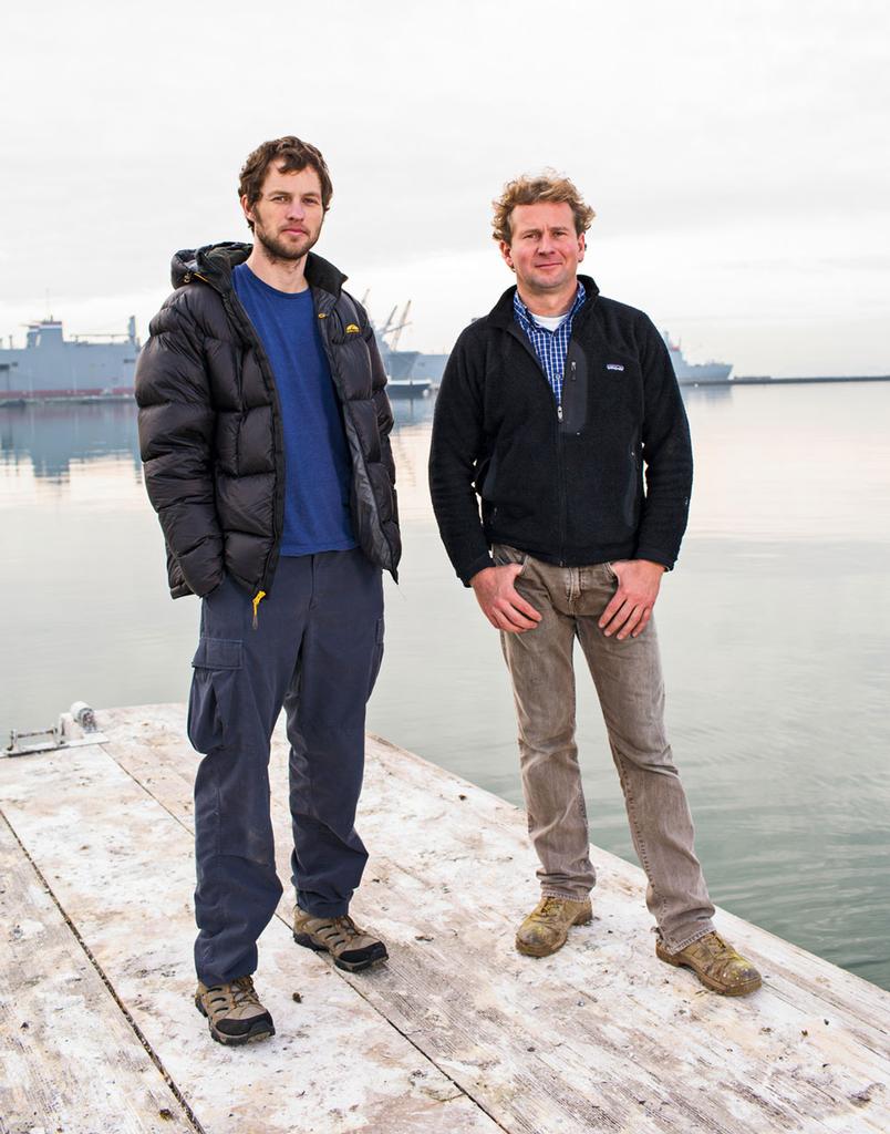 Richard Jenkins (right) designed the sailing robot; Dylan Owens handles the electronics. - The Drone That Will Sail Itself Around the World photo copyright Corey Arnold taken at  and featuring the  class