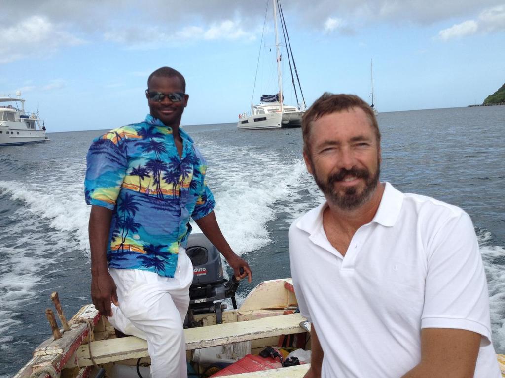 Paul with guide, Martin Carrierre, on a shoot in Dominica. Finding work you can do while cruising is the best of both worlds. © Sheryl Shard