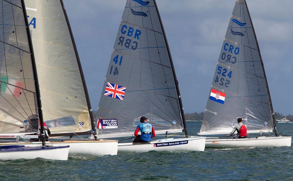 Giles Scott counts the boats between him and AUS Tweddell - ISAF Sailing World Cup Miami 2014 © Richard Langdon/British Sailing Team