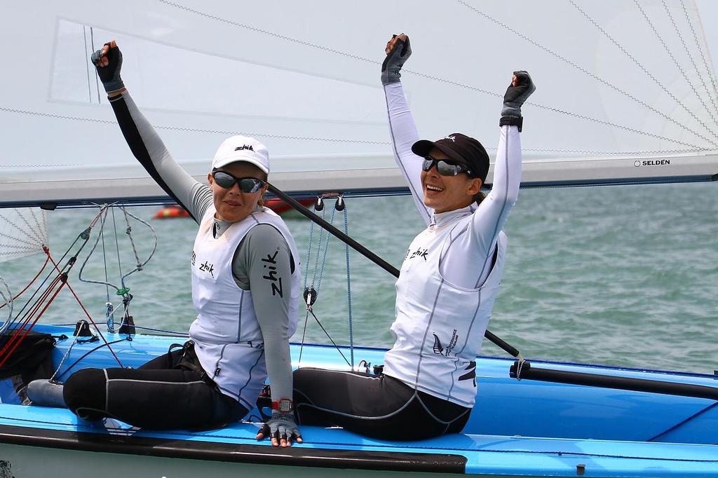 Part of the Zhik team,  Jo Aleh and Polly Powrie celebrate their Open 470 win at Oceanbridge Sail Auckland © Richard Gladwell www.photosport.co.nz