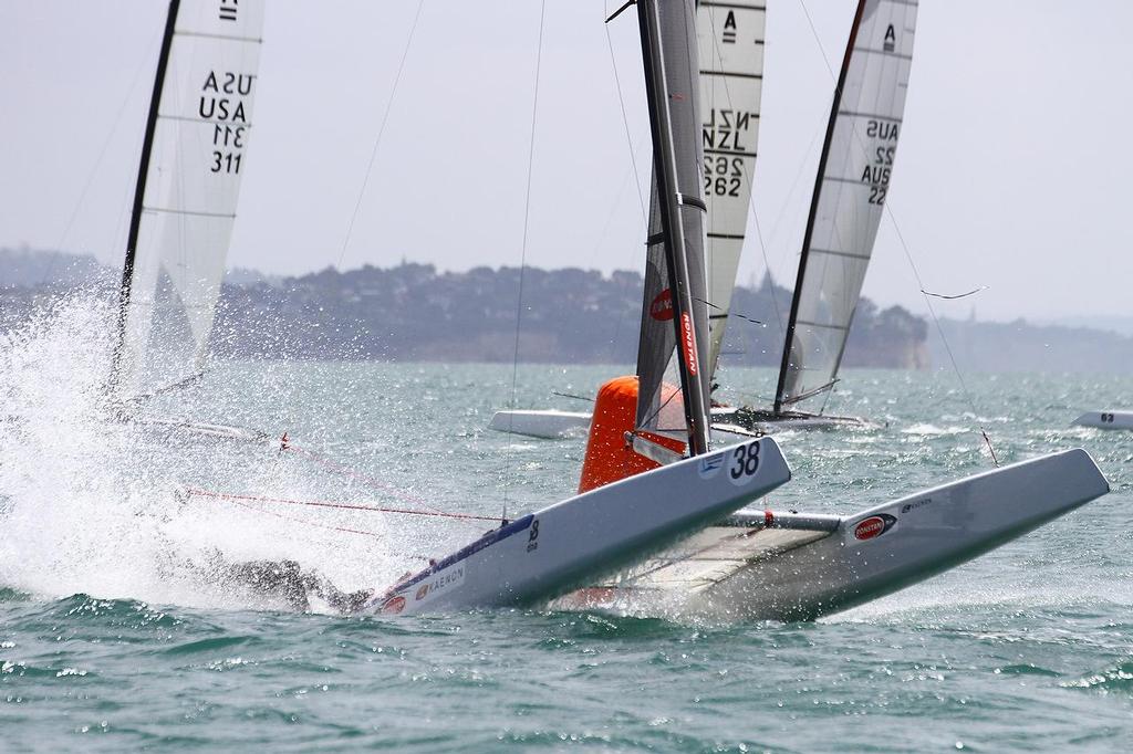 Glenn Ashby, A-class catamaran World Championships, Day 2, Takapuna February 12, 2014 photo copyright Richard Gladwell www.photosport.co.nz taken at  and featuring the  class