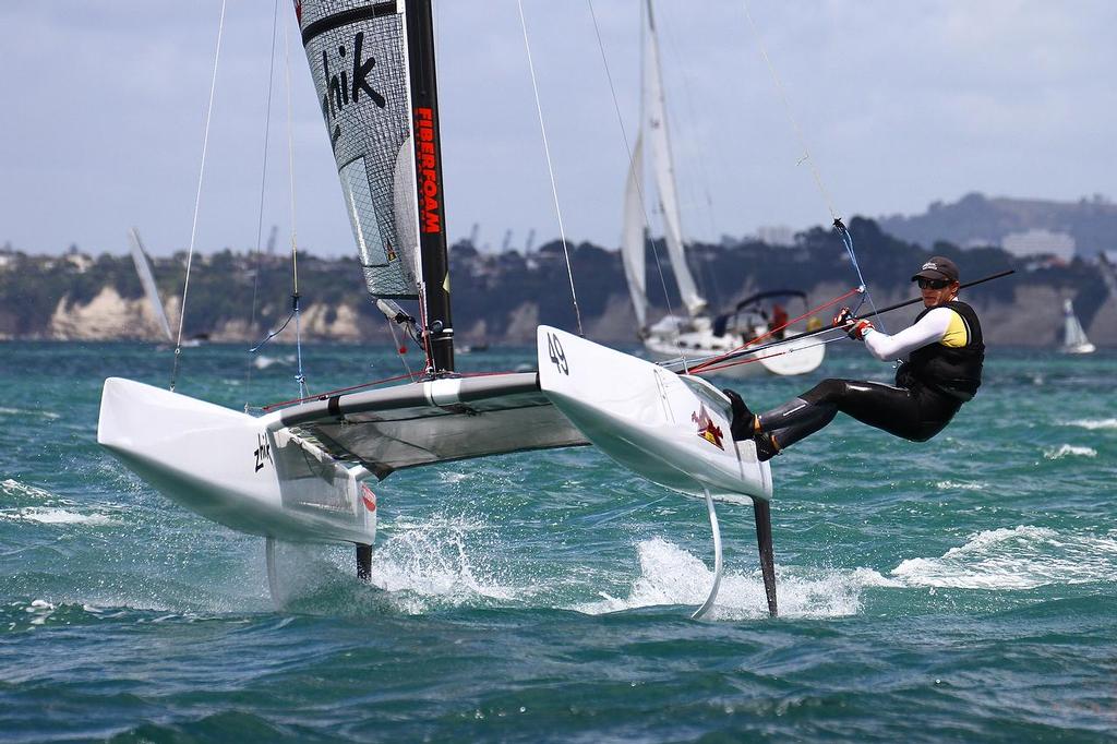 Nathan Outteridge 9AUS) A-class catamaran World Championships, Day 2, Takapuna February 12, 2014 photo copyright Richard Gladwell www.photosport.co.nz taken at  and featuring the  class