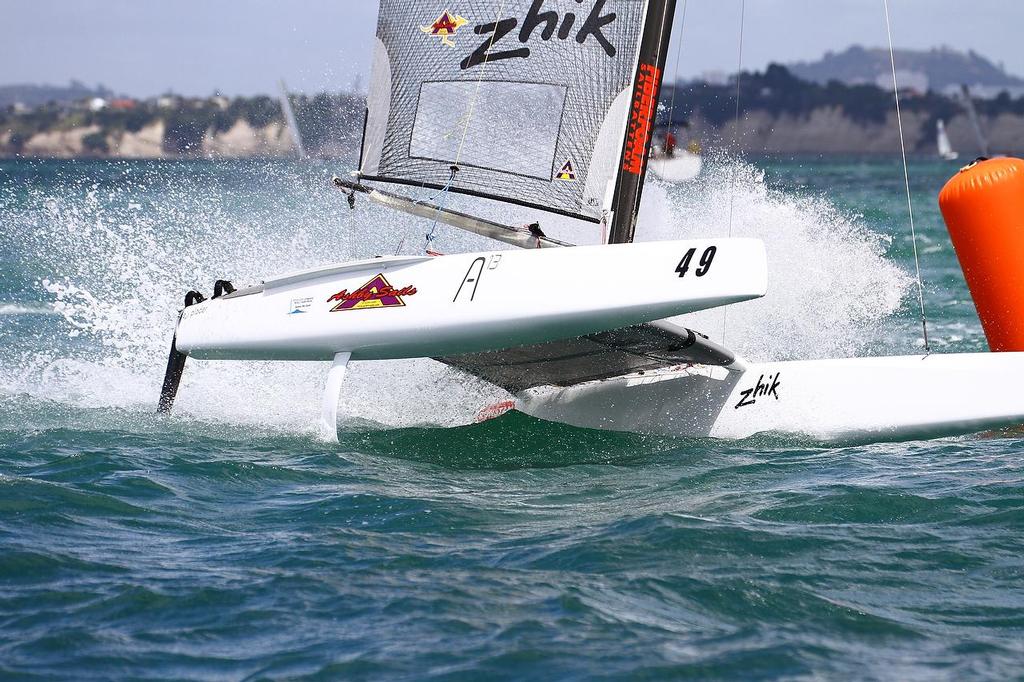 Nathan Outteridge, A-class catamaran World Championships, Day 2, Takapuna February 12, 2014 photo copyright Richard Gladwell www.photosport.co.nz taken at  and featuring the  class