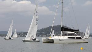 Part of the fleet works through the moorings on Brisbane Waters. - Garmin NSW Etchells Championship photo copyright  John Curnow taken at  and featuring the  class