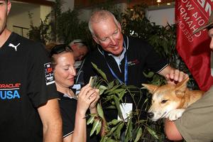 Sailing: Gill Melges 24 World Championships 2014, Royal Geelong Yacht Club, Geelong (Aus), 28/01/2014. Photo; Teri Dodds. Welcome Cocktail Party. Riccardo Simoneschi pats a dingo from Jirrahlinga Koala and Wildlife Sanctuary. photo copyright Teri Dodds taken at  and featuring the  class