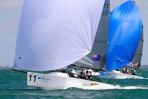 Sailing: Gill Melges 24 World Championships 2014, Royal Geelong Yacht Club, Geelong (Aus), 31/01/2014. Photo; Teri Dodds. Day 3 Racing - Roger That (Bow 17 - Cam Miles) with STAR (Blue Spinnaker - Harry Melges) photo copyright Teri Dodds http://www.teridodds.com taken at  and featuring the  class