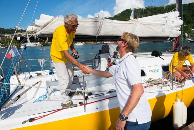 RORC's Nick Elliott welcomes Bingo to Grenada - RORC Transatlantic Race 2014. © RORC/Arthur Daniel and Orlando K Romain