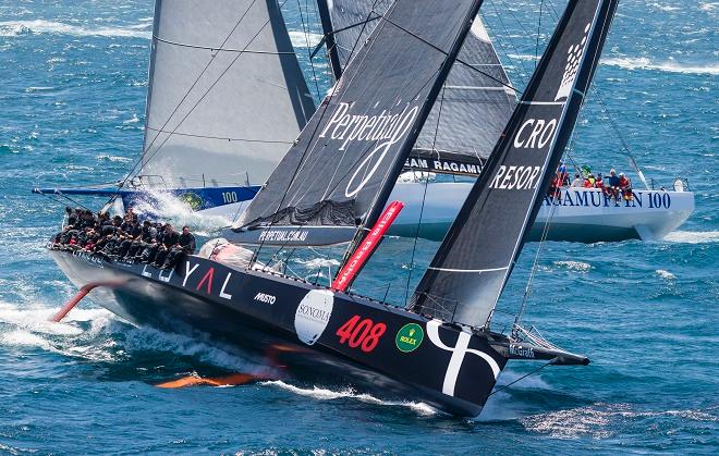 Perpetual Loyal (AUS) leads Ragamuffin 100 (AUS) as the 100ft Maxi battle begins - 2014 Rolex Sydney Hobart Yacht Race. ©  Rolex / Carlo Borlenghi http://www.carloborlenghi.net