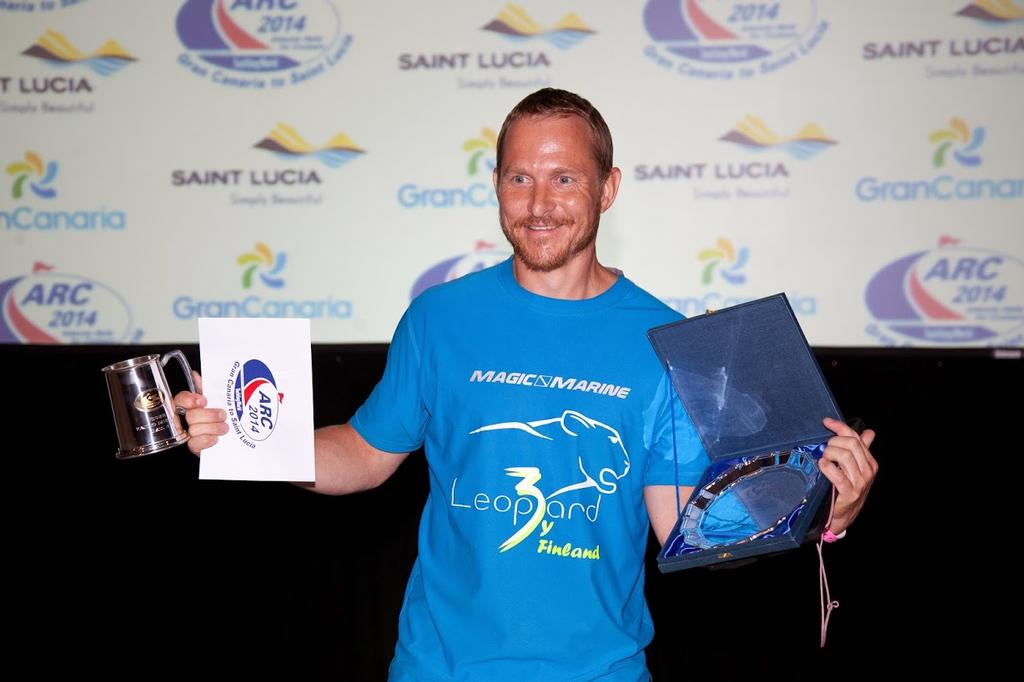 Leoopard by Finland took prizes for winners of IRC Racing Division Line Honours and Class A after their record breaking run - ARC 2014. © WCC / Clare Pengelly