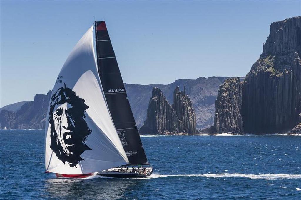 Comanche (USA) passing Tasman Island around noon - Rolex Sydney Hobart Race photo copyright  Rolex / Carlo Borlenghi http://www.carloborlenghi.net taken at  and featuring the  class