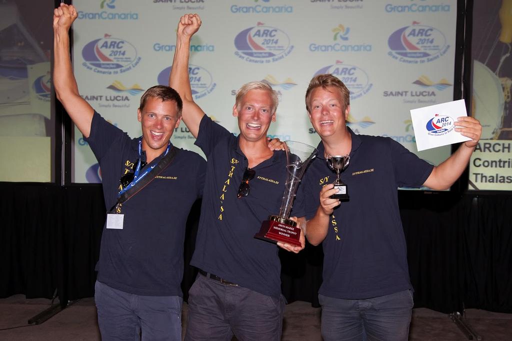 Thalassa accept the Arch Marez award, given in honour of their social contributions to shoreside activities  - ARC 2014. © WCC / Clare Pengelly