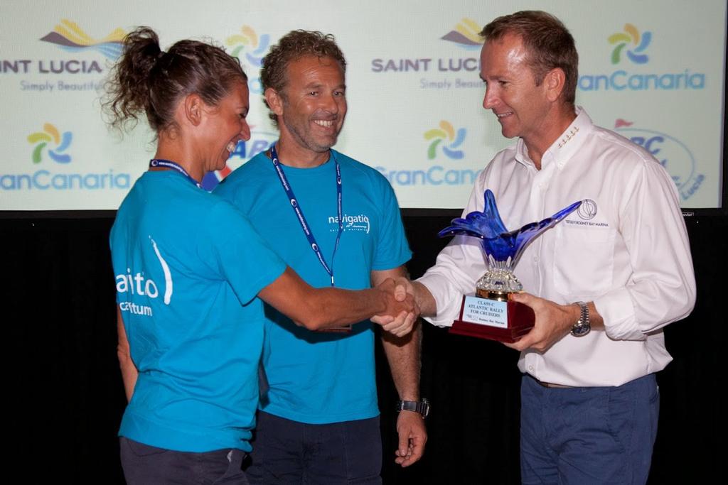 IGY Rodney Bay Marina Manager Simon Bryan presents Hiera with 1st place trophy for 1st in Cruising Class  - ARC 2014. © WCC / Clare Pengelly