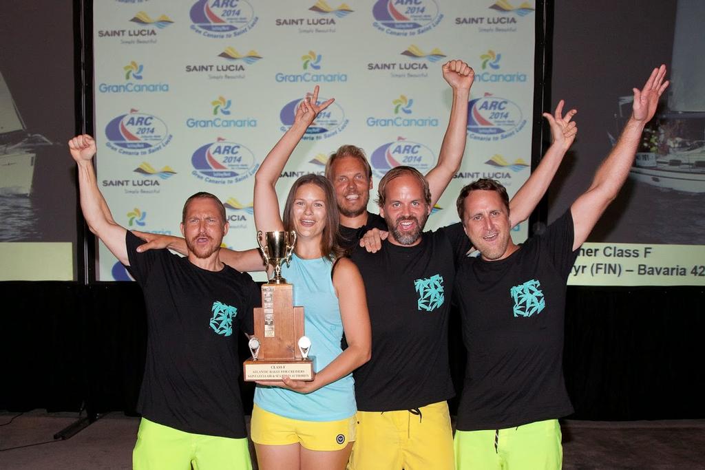 The crew of Defyr celebrate their 1st place in Cruising Division F - ARC 2014. © WCC / Clare Pengelly