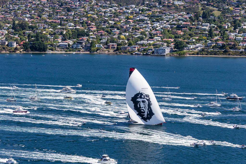 Comanche, Sail n: 12358, Bow n: 58, Design: Verdier Yacht Design & Vplp, Owner: Jim Clark & Kristy Hinze-Clark, Skipper: Ken Read closes at the finish line in the Derwent River - Rolex Sydney Hobart Yacht Race 2014. ©  Rolex / Carlo Borlenghi http://www.carloborlenghi.net