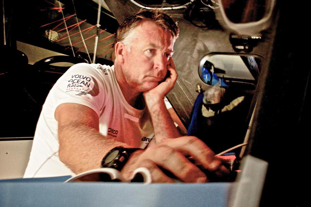 December 7, 2014. Leg 2 onboard Team Brunel. Andrew Cape checks the latest reports. photo copyright Stefan Coppers/Team Brunel taken at  and featuring the  class