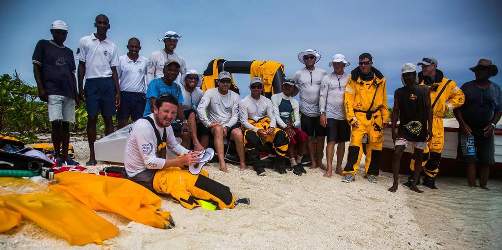 Team Vestas Wind aground on Cargados Carajos Shoals. The crew and their rescuers © Brian Carlin - Team Vestas Wind