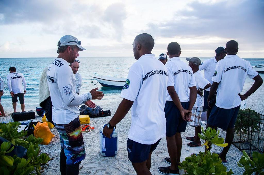 Team Vestas Wind aground on Cargados Carajos Shoals. Crew and rescuers debrief ashore. © Brian Carlin - Team Vestas Wind