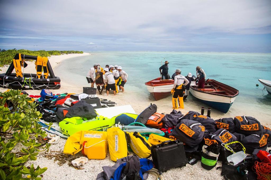 Team Vestas Wind on the Cargados Carajos Shoals, Mauritius, in the Indian Ocean. The crew lay the items they've retrieved from the boat, on the beach, ready to take to Mauritius.  © Brian Carlin - Team Vestas Wind