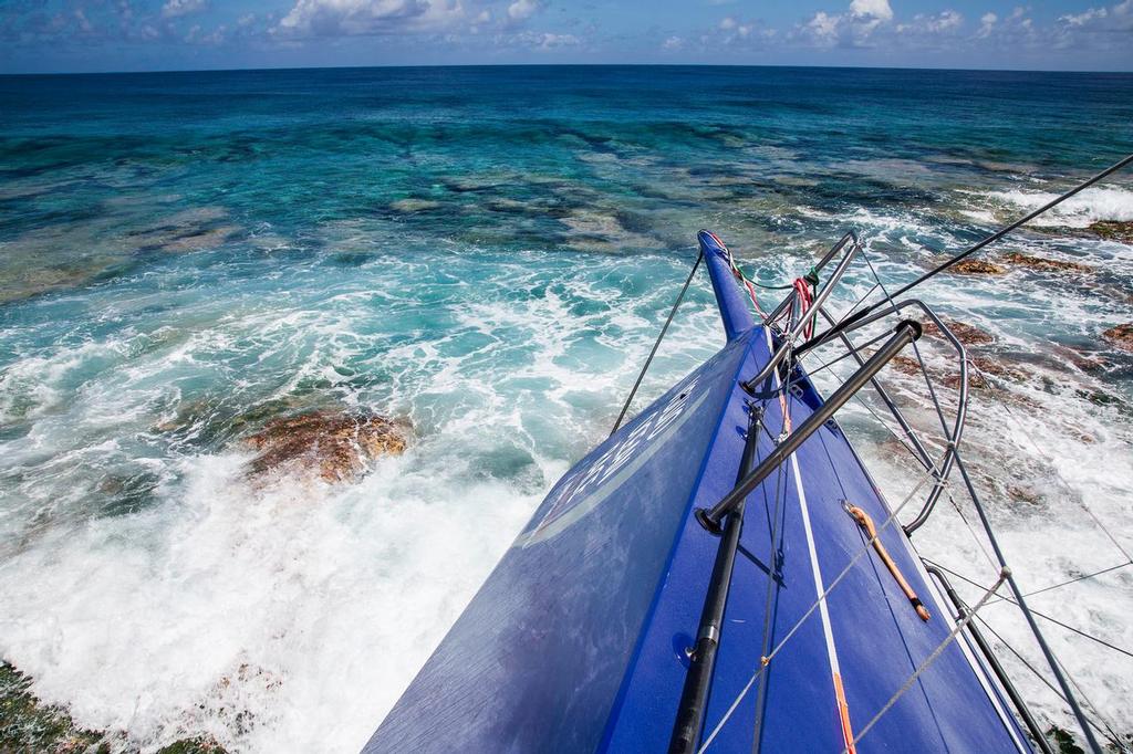 Team Vestas Wind grounded on the Cargados Carajos Shoals, Mauritius, in the Indian Ocean. She spun through 180 degrees on impact © Brian Carlin - Team Vestas Wind