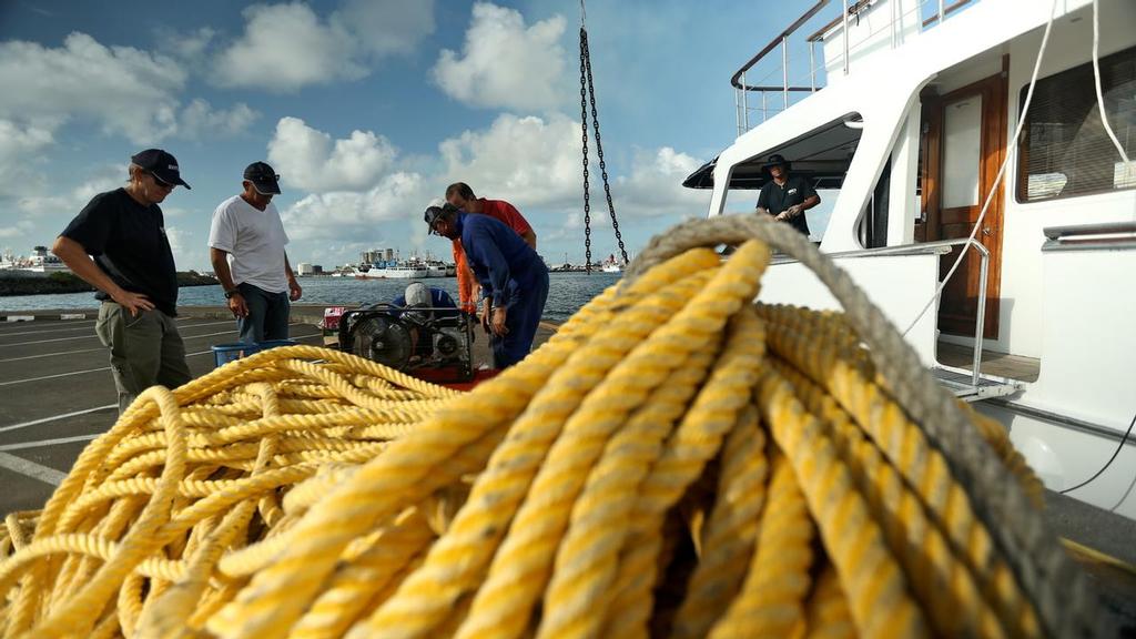 December 17, 2014. Crew members of Team Vestas Wind head back to the boat, that is currently grounded on the Cargados Carajos Shoals, to start the salvage and clean up. © Volvo Ocean Race http://www.volvooceanrace.com