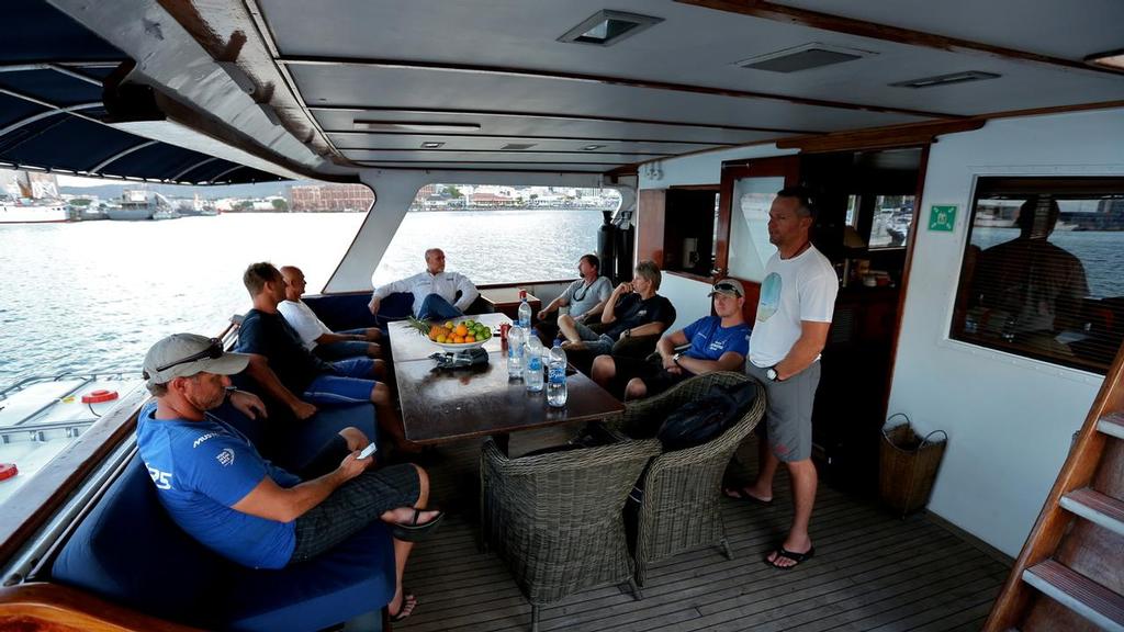 December 17, 2014. Crew members of Team Vestas Wind head back to the boat, that is currently grounded on the Cargados Carajos Shoals, to start the salvage and clean up. © Volvo Ocean Race http://www.volvooceanrace.com