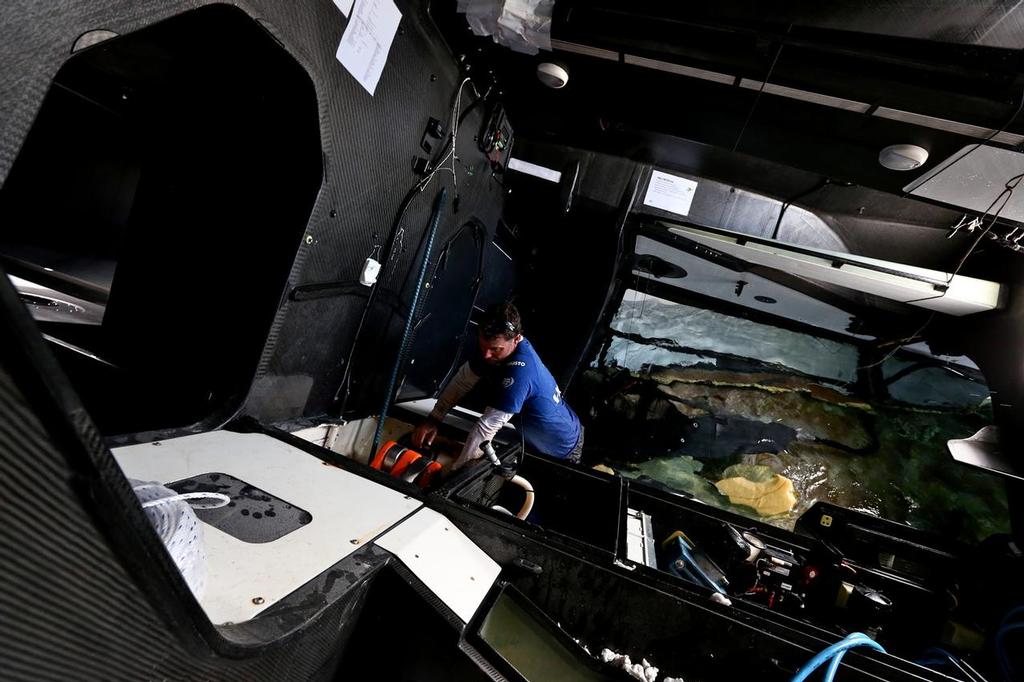 December 19, 2014. Neil Cox inside the boat at the beginning of the Team Vestas Wind salvage operation. © Shane Smart/Volvo Ocean Race http://www.volvooceanrace.com