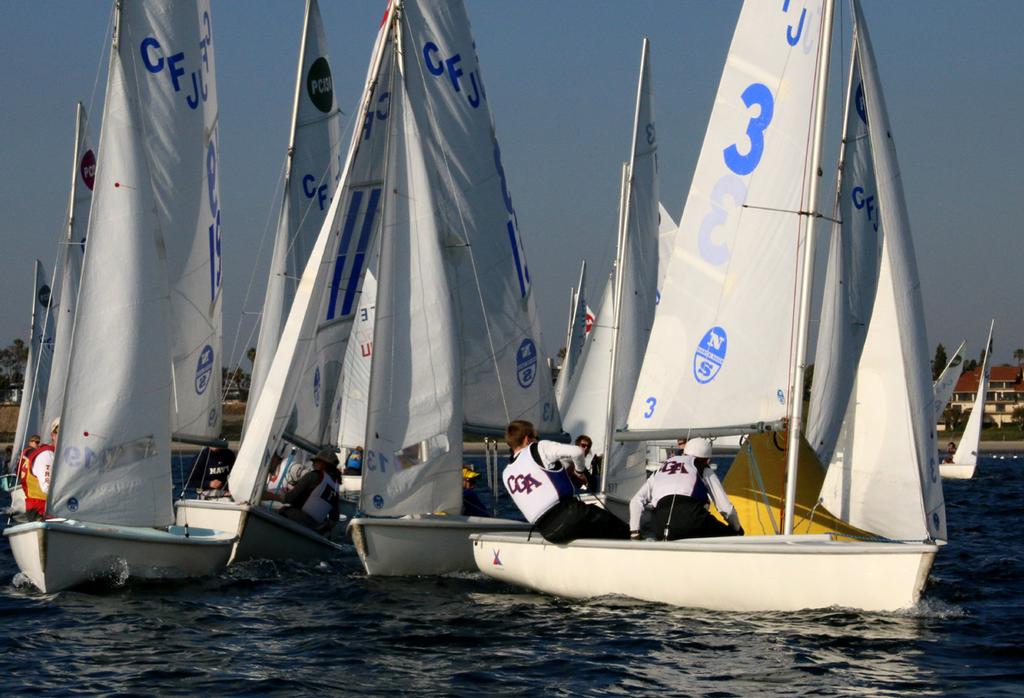 U.S. Coast Guard Academy, currently in second place, leads pack at the windward mark - 30th Rose Bowl Regatta 2015 - Day one. © Rich Roberts