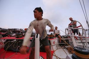 Leg Two, Day 19 - Black onboard  Black working hard onboard as the team fight to catch Team Brunel  - Volvo Ocean Race 2014-15. photo copyright Yann Riou / Dongfeng Race Team taken at  and featuring the  class