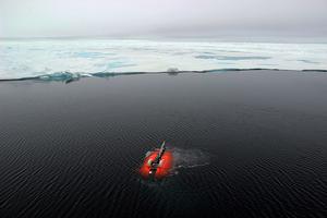 Nereid Under Ice is remotely operated by pilots aboard a surface ship via a lightweight, micro-thin, fiber-optic tether, which relays in real time environmental data, including high definition imagery of what the vehicle ``sees`` as it explores, maps, and gathers data beneath undisturbed sea-ice away from the disruptive impact of an ice-breaking research ship. photo copyright Chris German - WHOI taken at  and featuring the  class