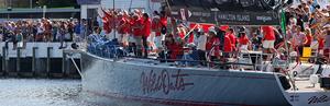 Gracious in victory; the Wild Oats XI crew cheer the arrival of Comanche into Constitution Dock photo copyright Crosbie Lorimer http://www.crosbielorimer.com taken at  and featuring the  class