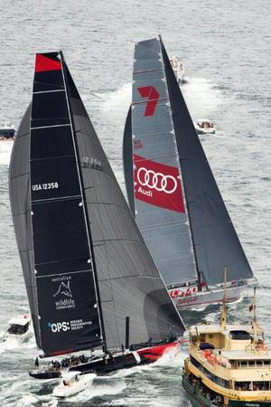 Ferry Close: An Andrea Francolini image from this year’s Solas Big Boat Challenge on Sydney Harbour – supermaxis Wild Oats XI and Comanche squeeze behind a harbour ferry. photo copyright Andrea Francolini http://www.afrancolini.com/ taken at  and featuring the  class