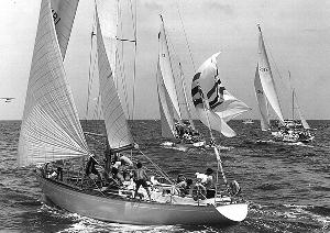 Warren Brown at the helm of War Baby KB1. Brown died Christmas Day in Bermuda. He was 85 and had sailed over 300,000 miles. He was a recipient of the Cruising Club of America’s Blue Water Medal. photo copyright Talbot Wilson taken at  and featuring the  class
