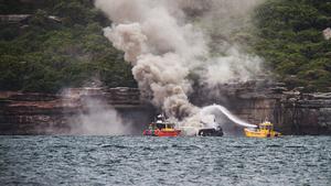 Boat fire Sydney harbour November 19, 2014 photo copyright Beth Morley - Sport Sailing Photography http://www.sportsailingphotography.com taken at  and featuring the  class