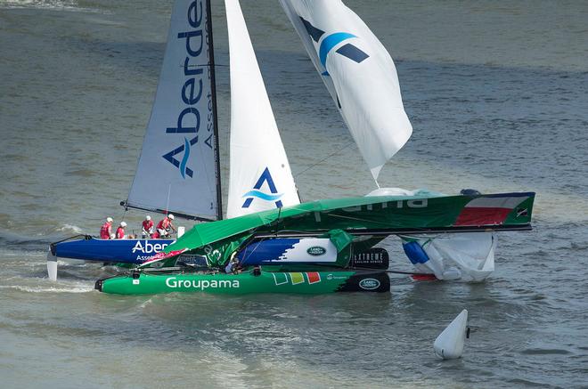 Team Aberdeen Singapore crashed into Groupama sailing team in race five of the day in Singapore.  - Extreme Sailing Series™ 2014 © Lloyd Images