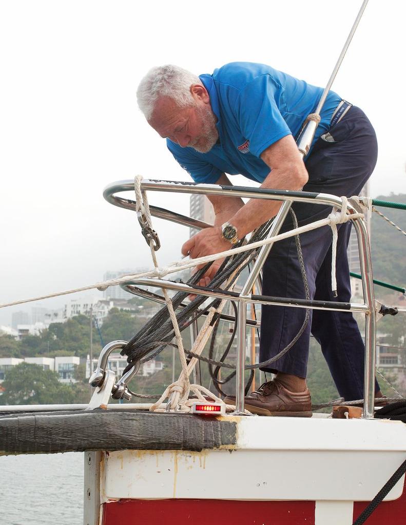 CLIPPER pitstop in Hong Kong . Replacing the damaged bottlejack with dyneema. 
 photo copyright Guy Nowell http://www.guynowell.com taken at  and featuring the  class