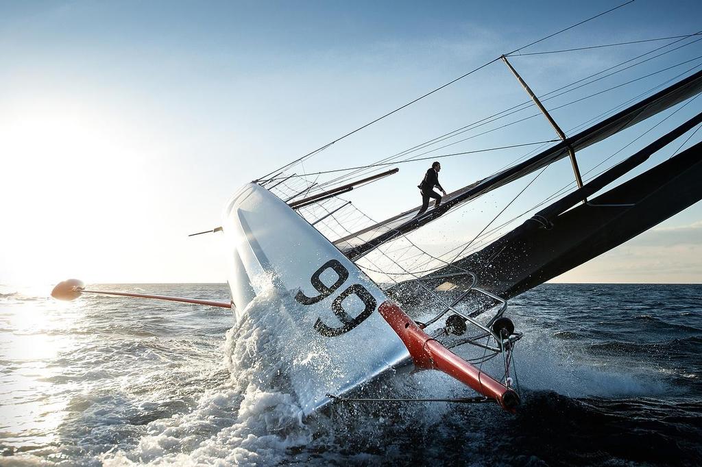 Pictures of Alex Thomson the skipper of the Hugo Boss IMOCA Open 60 race yacht walking up the mast of his yacht whilst sailing. 
Credit - Lloyd Images/Alex Thomson Racing photo copyright Lloyd Images/Alex Thomson Racing taken at  and featuring the  class