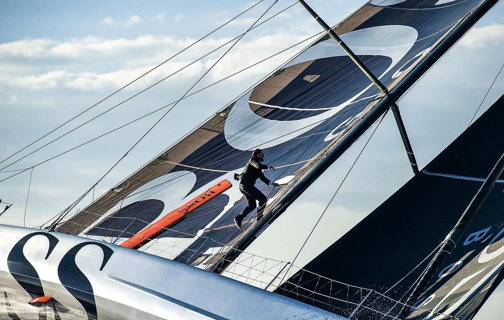 Pictures of Alex Thomson the skipper of the Hugo Boss IMOCA Open 60 race yacht walking up the mast of his yacht whilst sailing.<br />
 © Lloyd Images/Alex Thomson Racing