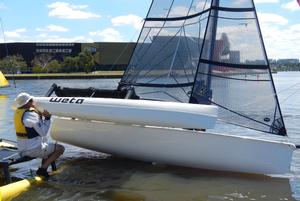 Getting a helping hand to try and capsize - Weta Regatta, February 2014, Canberra, Australia photo copyright Miranda Powrie taken at  and featuring the  class