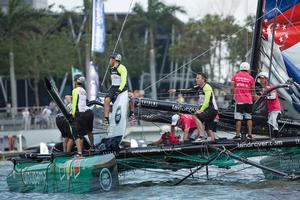 Team Aberdeen Singapore crashed into Groupama sailing team during race 20 of Act 1, Singapore.  - Extreme Sailing Series™ 2014 photo copyright Lloyd Images taken at  and featuring the  class