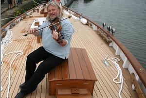 Phil Beer in sea shanty mode photo copyright  SW taken at  and featuring the  class