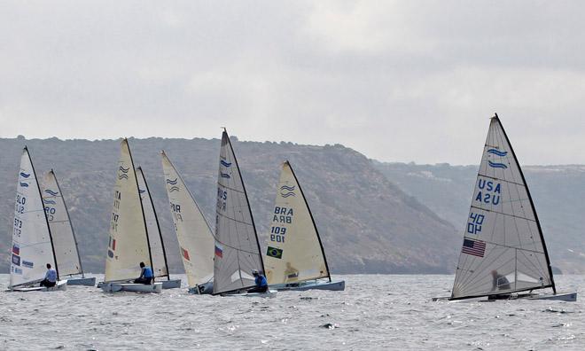 Finn fleet on opening day of the 45th Trofeo Princesa Sofia, ISAF Sailing World Cup Mallorca © Robert Deaves/Finn Class http://www.finnclass.org