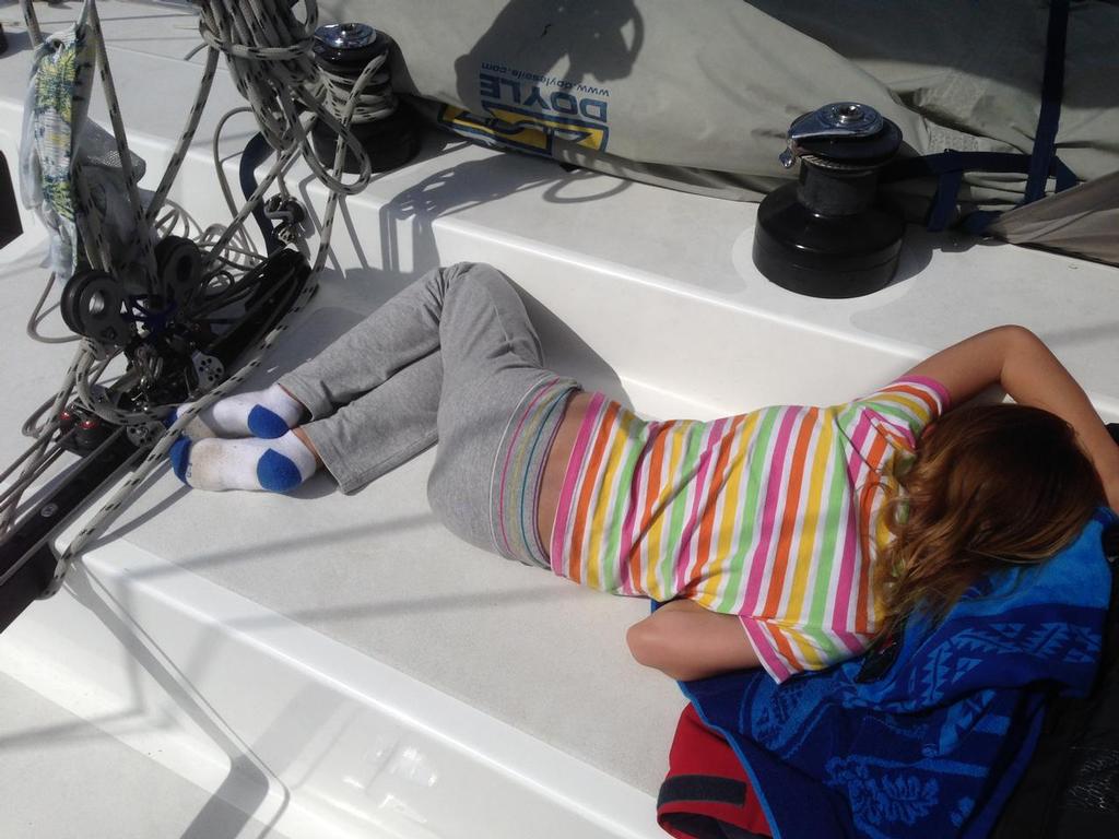 Heading home.  A busy weekend has finally caught up with Sylvie Manning (8) - NZ E5.9 Association Kawau Weekend 2014 photo copyright Elliott 5.9 Association Media taken at  and featuring the  class